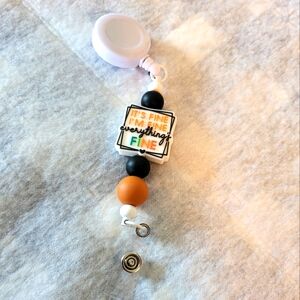 Retractable badge holder